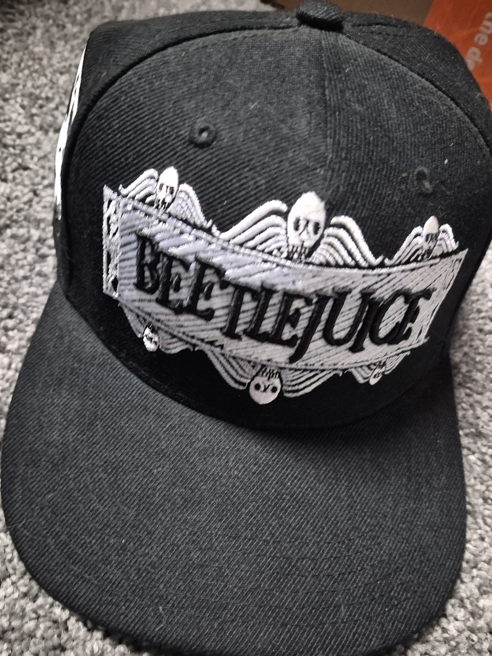 Beetlejuice Black Snapback Hat with White Embroidered Logo
